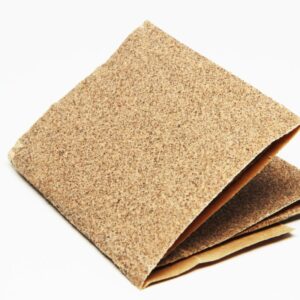 a square piece of sandpaper fold into fourths